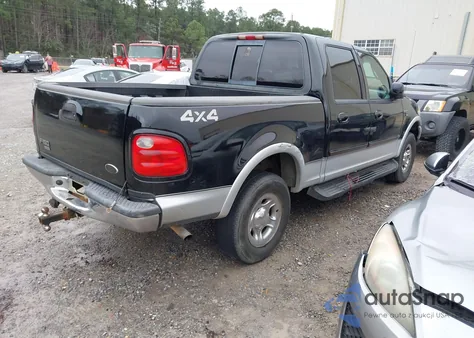 2001 Ford F-150 King Ranch Edition/Lariat/Xlt z USA, uszkodzony, nr VIN 1FTRW08L61KA21736